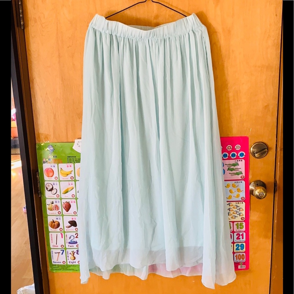 Zara pleated long skirt in icy green.